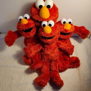 RARE FIND LARGE/SMALL ELMO PLUSHS